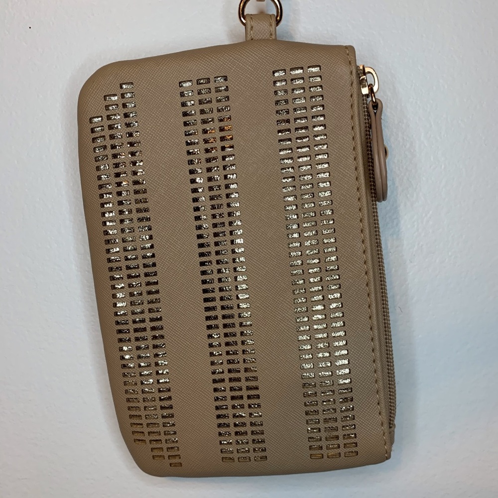 NWOT creme leather with‎ glitter cut out wristlet